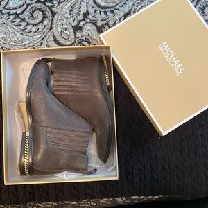 Michael Kors brown leather booties with gold accents